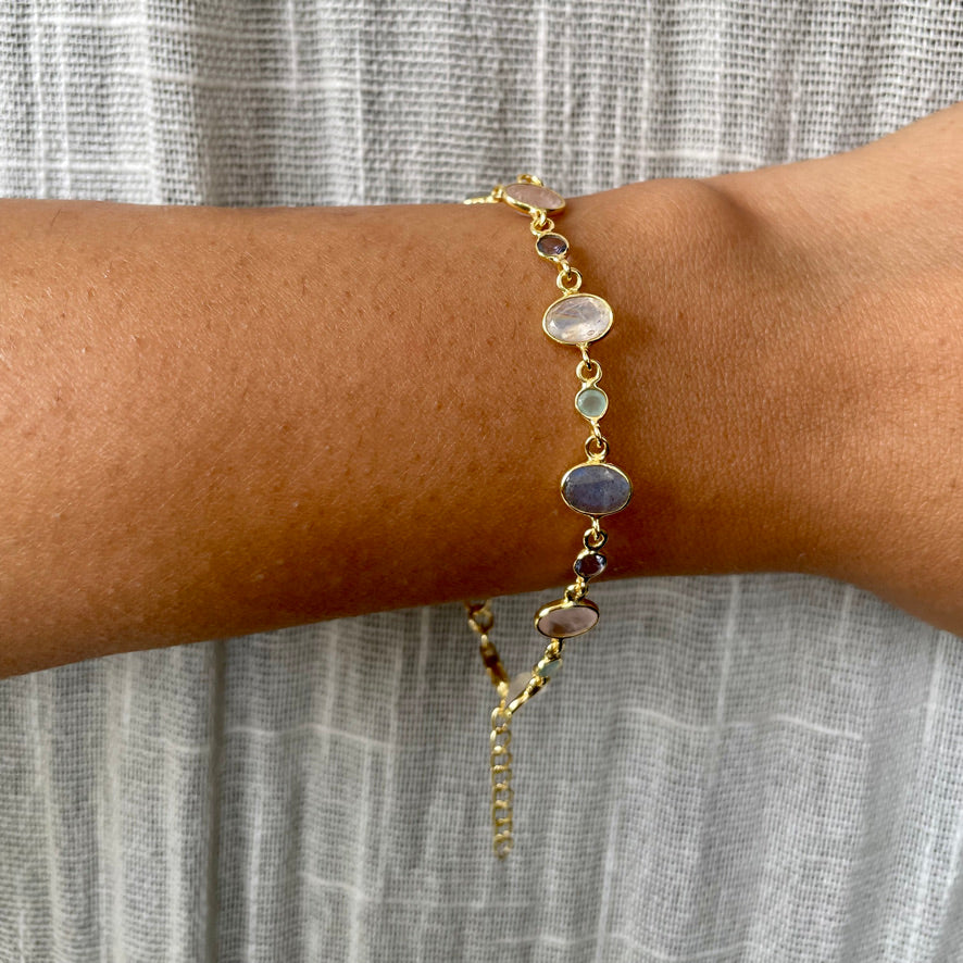 Adjustable pastel-hued silver bracelet with natural faceted gemstones