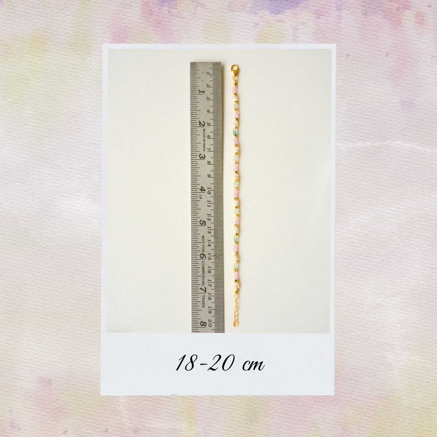 Handcrafted silver bracelet with faceted pastel gemstones and pearl
