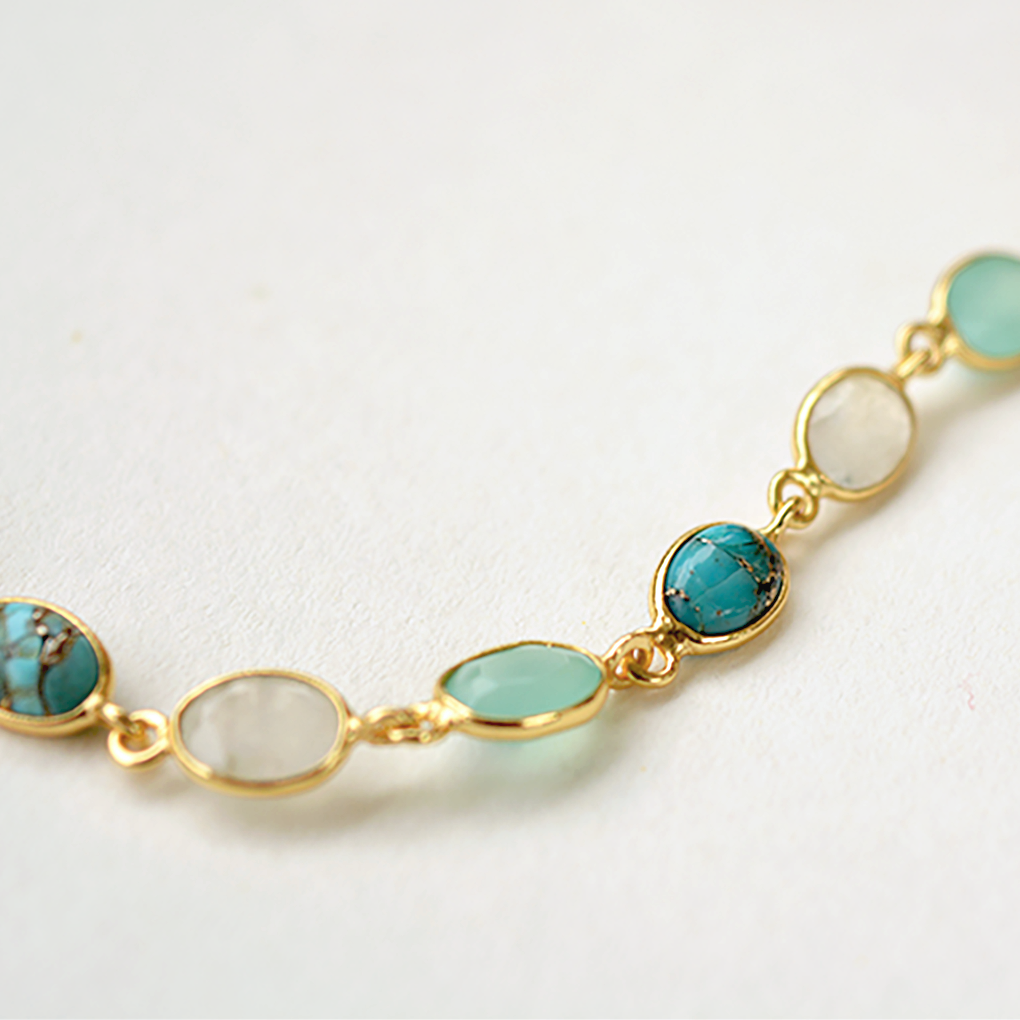 Handcrafted silver bracelet with turquoise, moonstone, and aquamarine