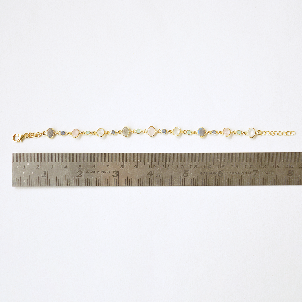 Adjustable pastel-hued silver bracelet with natural faceted gemstones