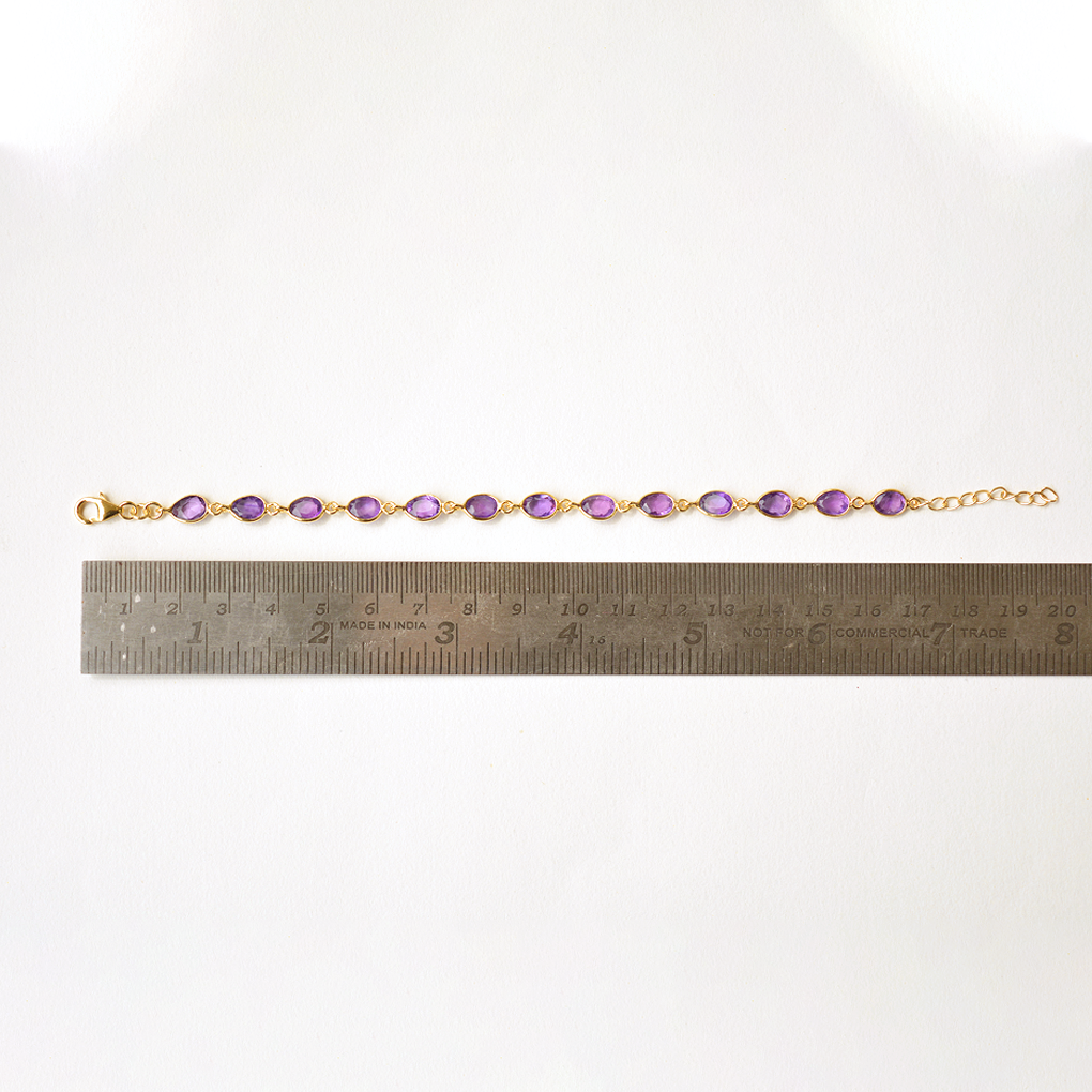 Gold-plated sterling silver bracelet with oval-cut amethyst stones