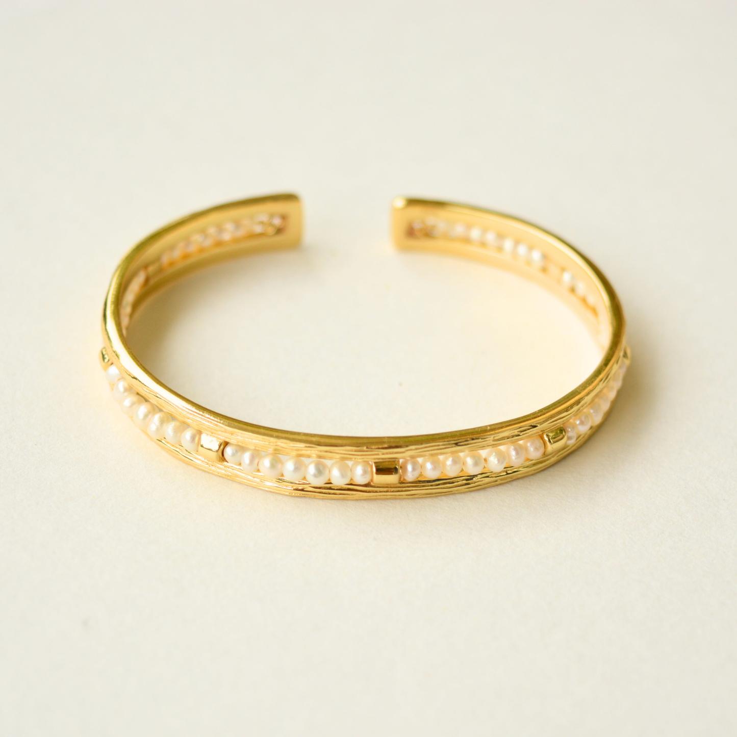 Minimal gold-plated silver cuff with pearl beads