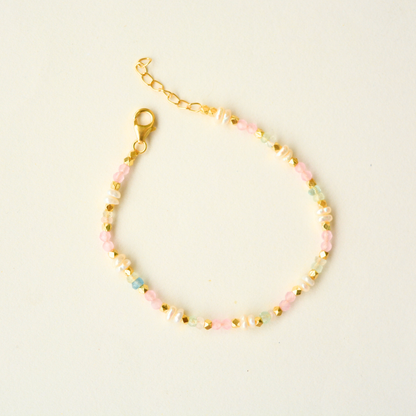 Adjustable dainty beaded bracelet in pastel colours with gold plating