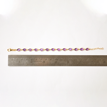 Gold-plated sterling silver bracelet with oval-cut amethyst stones
