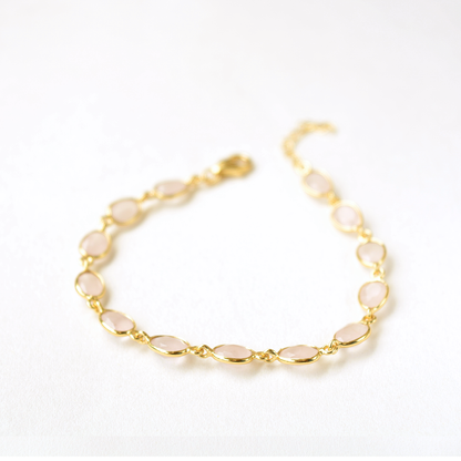 Adjustable chain bracelet with multiple rose quartz stones