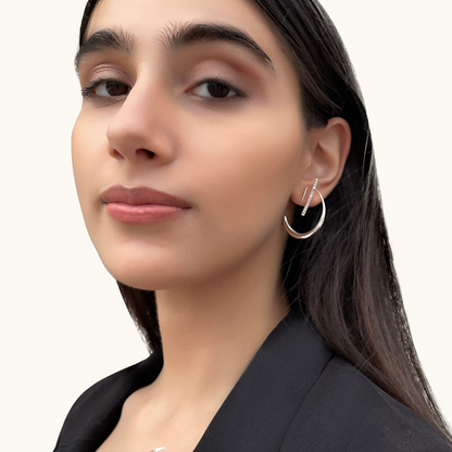 Close-up of a model styled in La Luna Platinum Earrings, showcasing a modern and sophisticated celestial jewelry look.