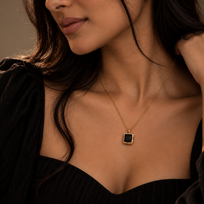 Woman wearing Onyx Square Pendant in 925 Sterling Silver with 18K Gold Plating and Black Onyx Stone