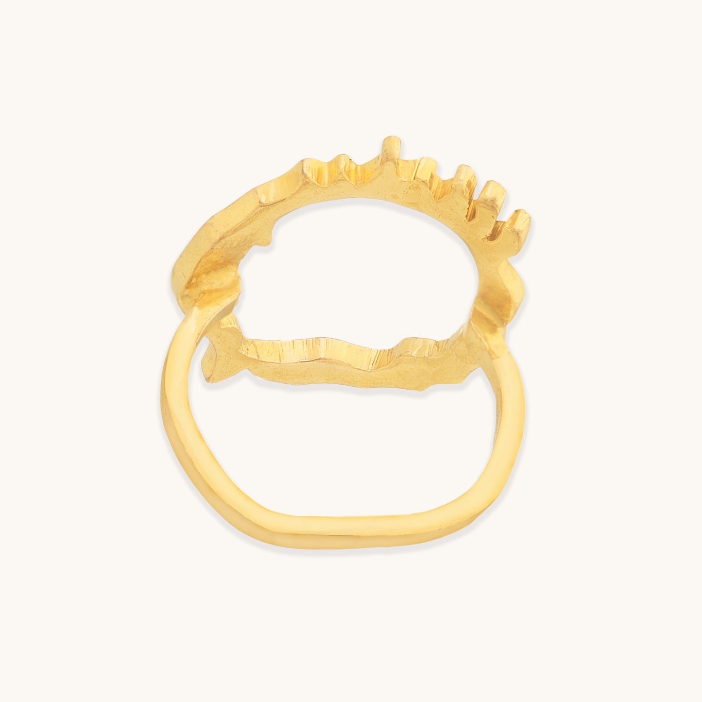 Back view of a yellow gold-plated ring showcasing its three-dimensional, melted texture and hollow center on a clean white background.