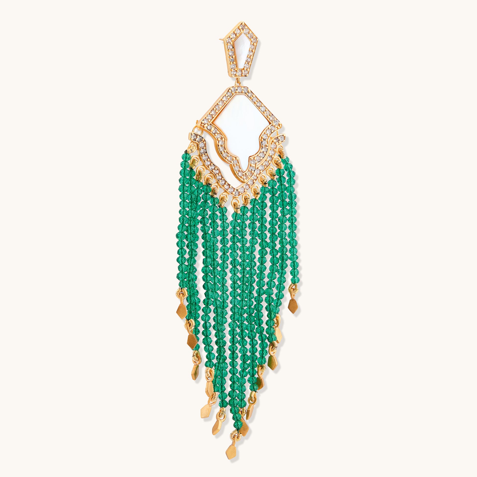 Full view of an elaborate gold-toned tassel earring featuring a geometric  pearl and cubic zirconia accents top piece with multiple strands of emerald green beads.