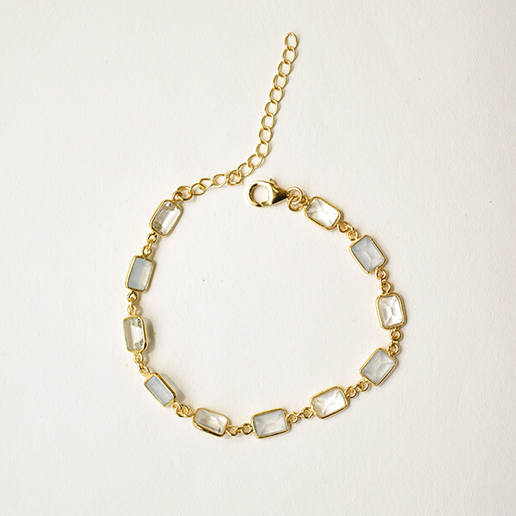 Dainty chain bracelet featuring a series of vibrant, rectangular-cut natural stones in a gold-plated setting.