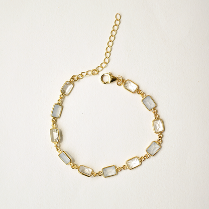 Dainty chain bracelet featuring a series of vibrant, rectangular-cut natural stones in a gold-plated setting.