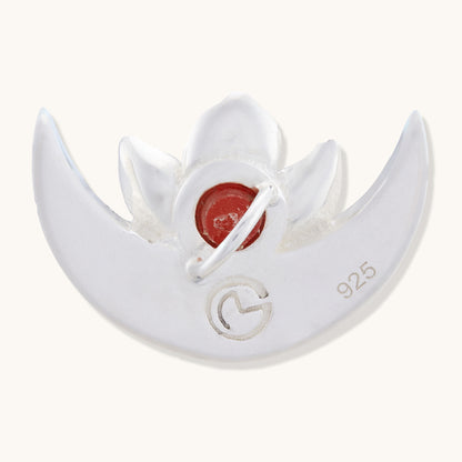 Back view of the sterling silver half-moon pendant, showing the "925" hallmark stamp and the reverse of the red gemstone setting.