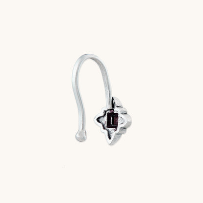 A detailed profile view of a silver-toned, non-piercing nose clip-on, highlighting the smooth hook mechanism and textured metal design.
