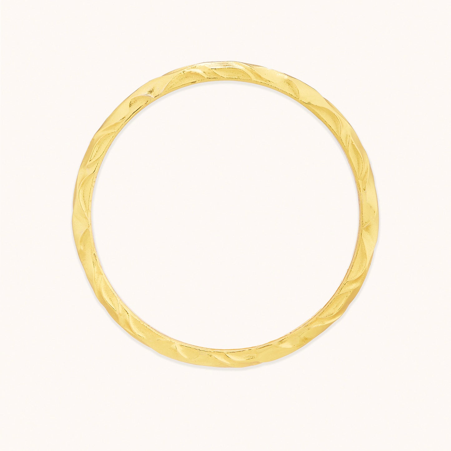 Top-View of Infinity bangle on white surface