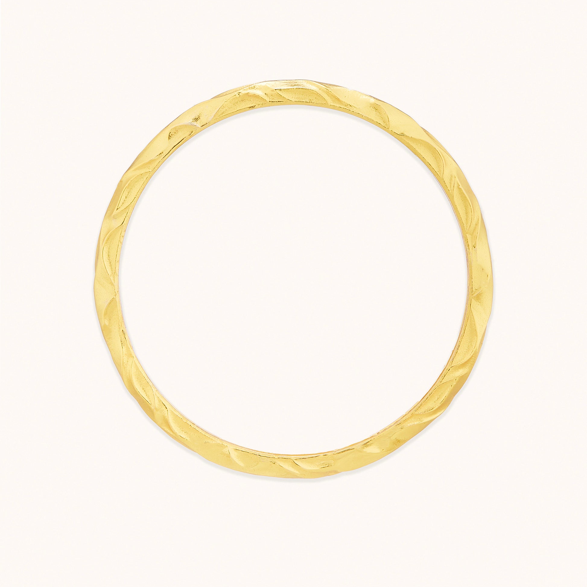 Top-View of Infinity bangle on white surface