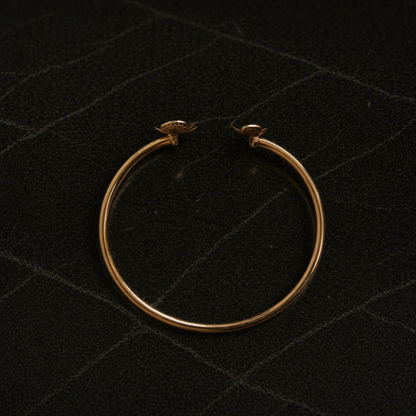 Top-down flat lay of the handcrafted Blushing Blooms Bangle in rose gold-plated 925 sterling silver, highlighting the circular frame.