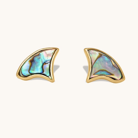 Pair of gold-trimmed wave-shaped stud earrings featuring iridescent abalone shell inlays.
