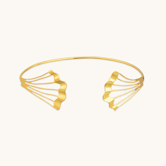 Front view of a Gold Flow Necklet, a minimalist 18k gold-plated open choker with wavy, fan-like architectural details.