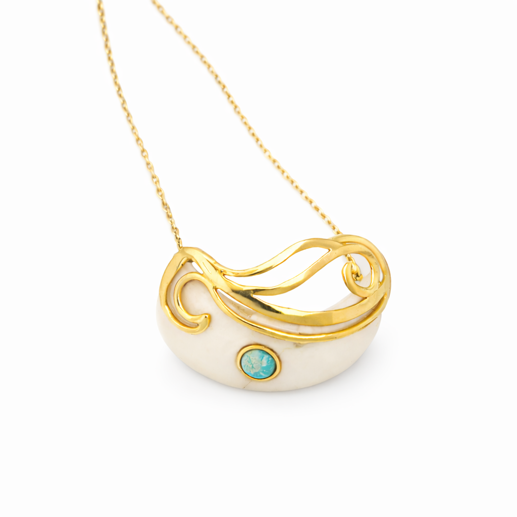 Angled studio shot of the Mystic Turquoise Necklace on a white background.