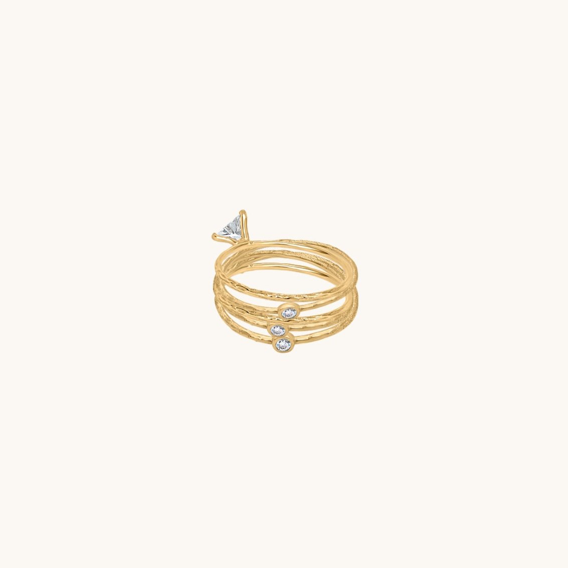 Delicate celestial stacking rings in a high-shine silver finish, layered look, isolated on light background.