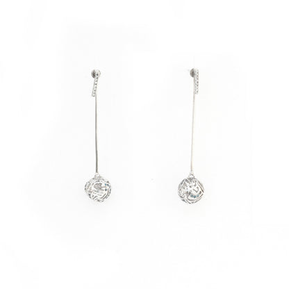 Handcrafted platinum-plated brass drop earrings featuring a tiered wave design with intricate silver jali lattice work and vibrant turquoise blue gemstones.