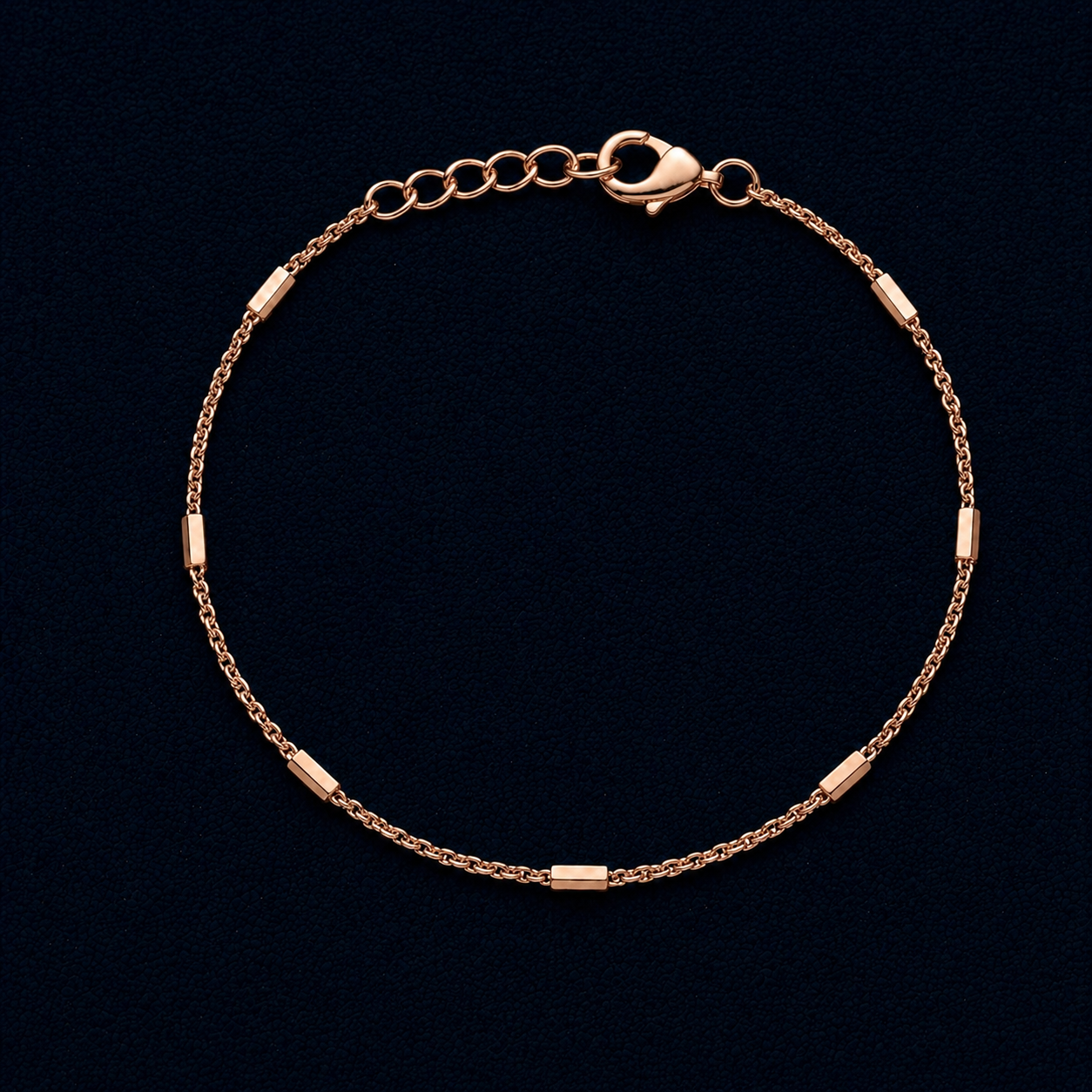 A full circular view of the Bar Rhythm bracelet featuring seven polished rose gold-plated rectangular bars on a delicate chain with an adjustable clasp, displayed on a dark navy background.