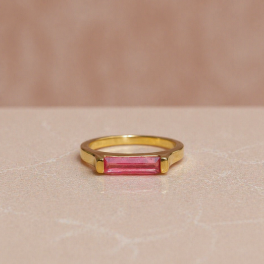 Frontal product shot of the Blush Glow Ring, showcasing the delicate blush tone of the rectangle-cut pink jade and the clean, minimal design.