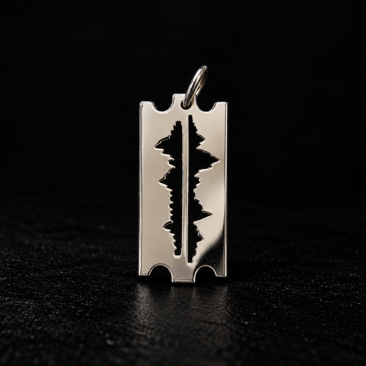 Mountains Are My Lifeline large pendant in polished 925 silver with mountain-range cut-out, on a dark surface