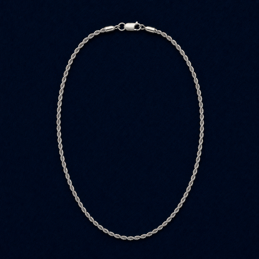 A full studio shot of the handcrafted Easy Everyday Elegance necklace in 925 sterling silver, featuring a classic twisted rope chain design on a dark navy background.