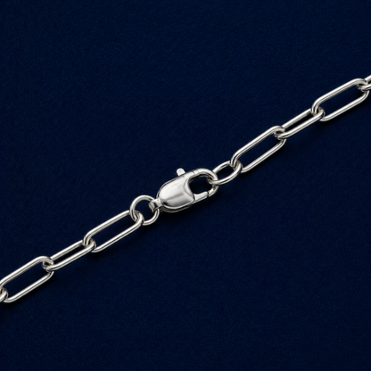 A detailed close-up of the Urban Paperclip Chain highlighting the polished 925 silver finish of the elongated links and the secure, high-quality lobster clasp closure.