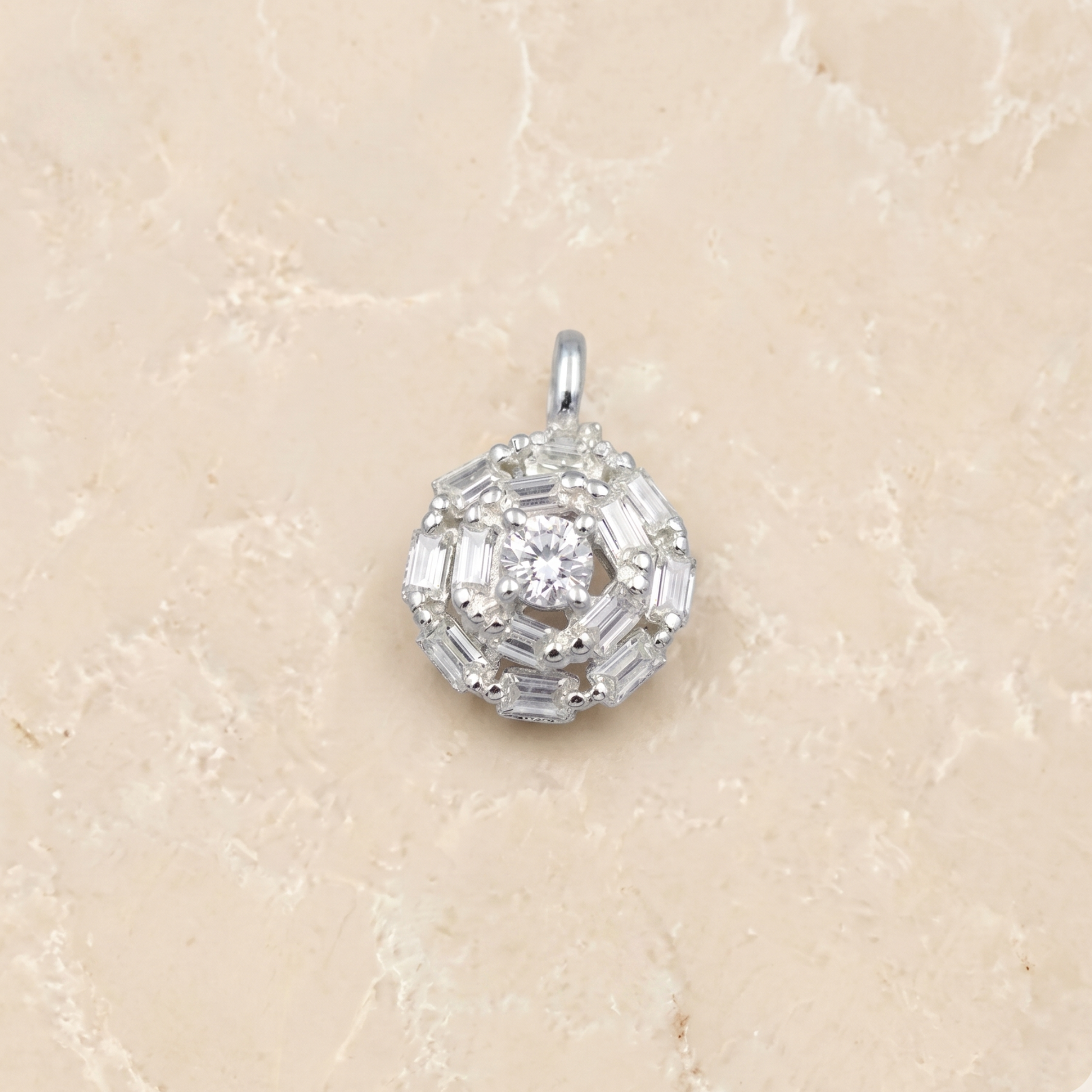 Frontal view of the Soft Sparkle pendant featuring a flower-shaped cluster of brilliant cubic zirconia stones set in polished 925 sterling silver.
