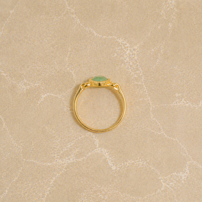 Calm Aura Ring showcasing the slim 925 sterling silver band and the vibrant green tones of the square diamond-shaped stone.