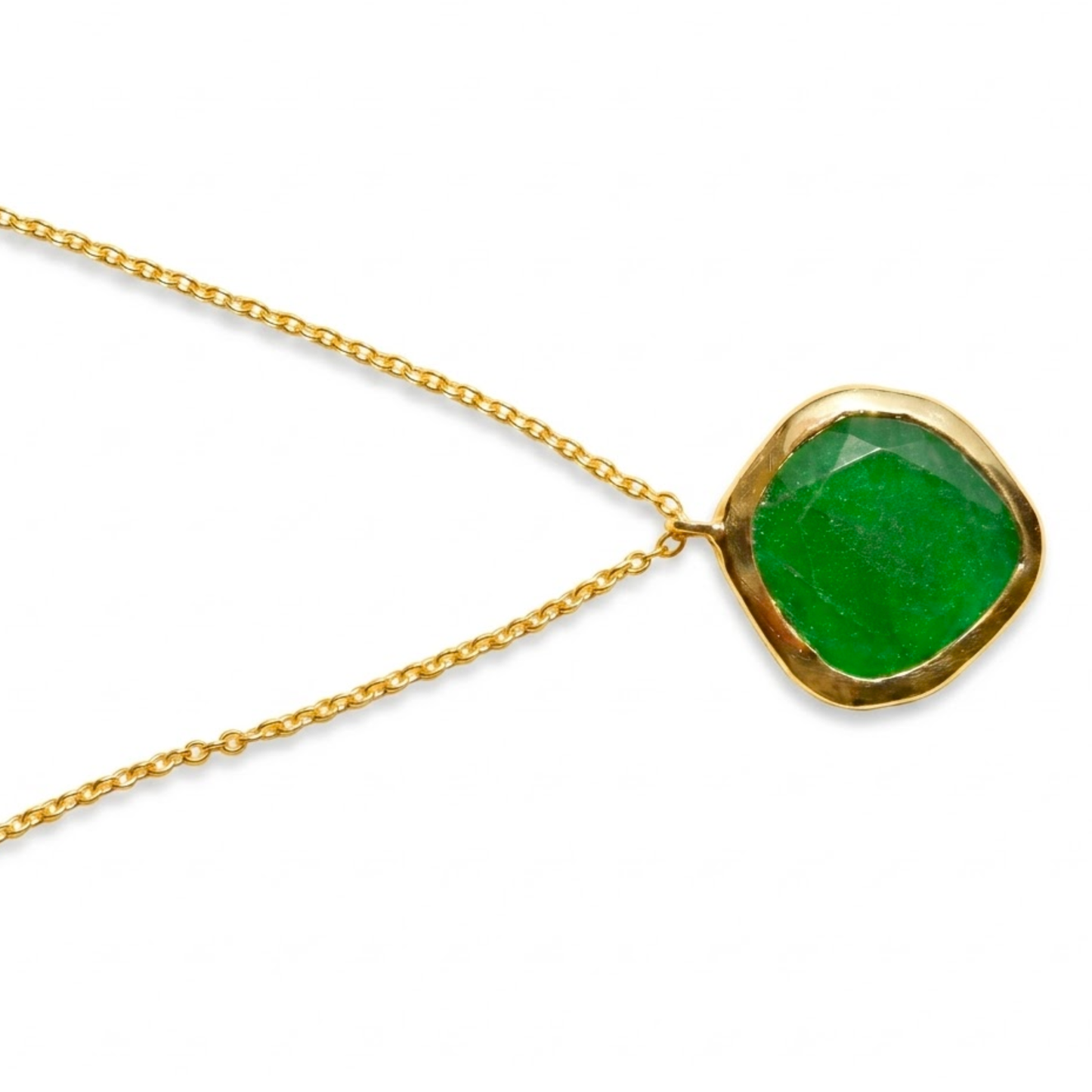 Detailed close-up of the Natural Pop pendant, showcasing the natural depth and facets of the irregular square green onyx stone set in polished gold.