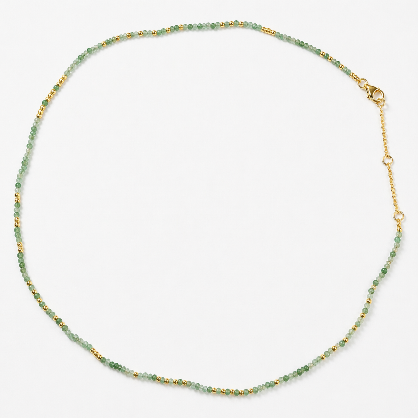 Full studio shot of the Nature’s Calm necklace on a white background, displaying the delicate mixed-stone beaded strand and the adjustable 18kt gold plated lobster clasp.