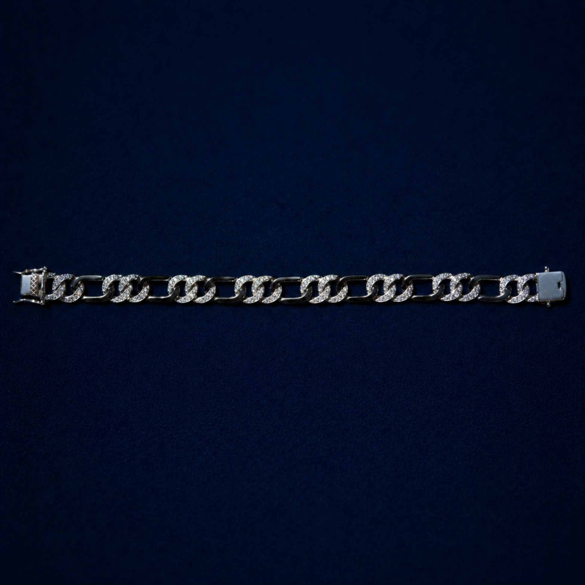 A top-down view of Effortless Edge bracelet on a dark navy background, displaying the rhythmic architectural design.