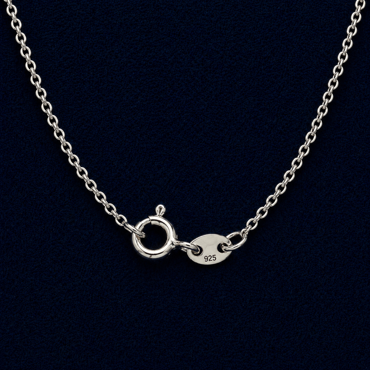 Macro shot of the delicate slim chain and 925 silver lobster clasp, showcasing the refined finish and lightweight handcrafted design.
