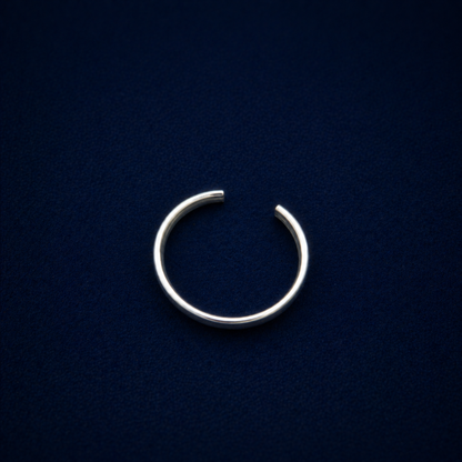 Top-down silhouette of the A Little Statement Ring, highlighting the clean open-back cuff design and sleek 925 silver craftsmanship.