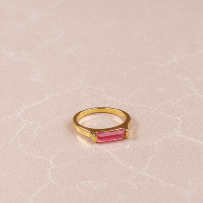Side perspective of the handcrafted Blush Glow Ring showing the modern structured setting and the polished gold finish that complements the soft pink jade stone.