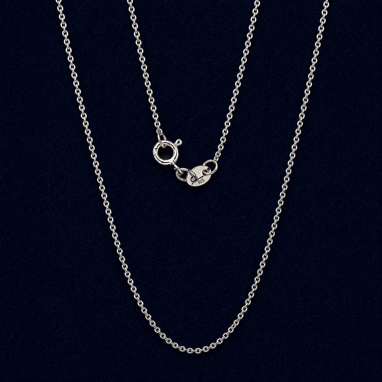 A full view of the handcrafted 925 sterling silver Modern Minimal Simplicity necklace, featuring a slightly bolder link chain and a distinctive hoop lock detail against a dark navy background.