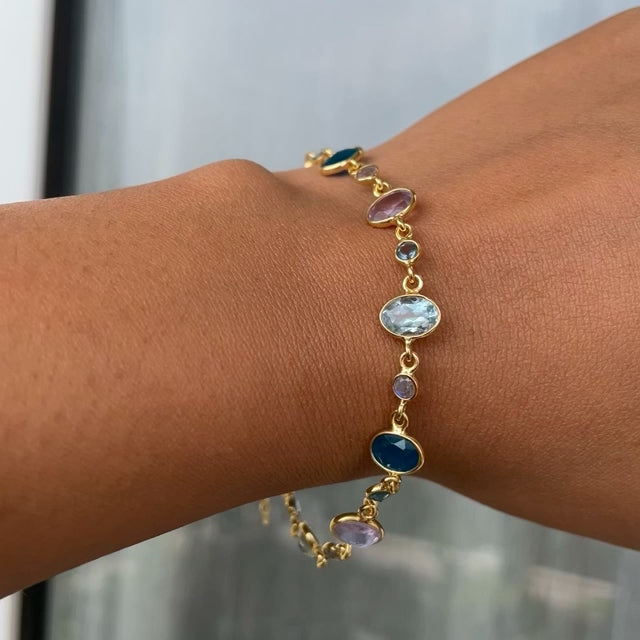 Adjustable silver bracelet with faceted natural stones and lobster clasp