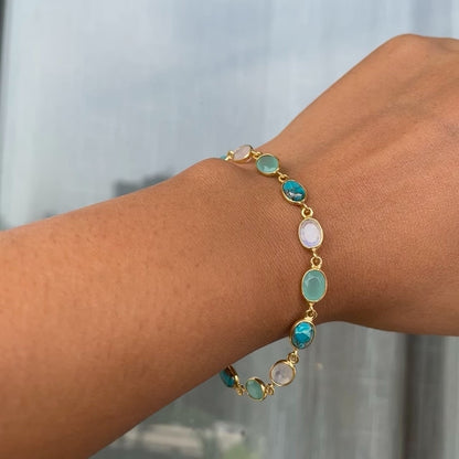 Handcrafted silver bracelet with turquoise, moonstone, and aquamarine