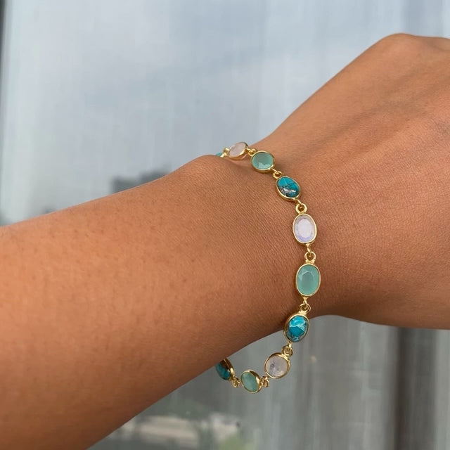 Handcrafted silver bracelet with turquoise, moonstone, and aquamarine
