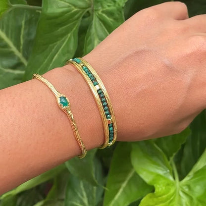 Adjustable cuff bracelet with wood-inspired textured design and authenticity certificate