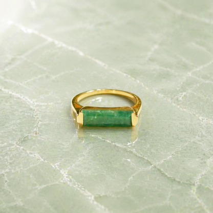 Frontal view of the Calm Elegance Ring highlighting the soothing green hue of the rectangle-cut aventurine stone and the structured, polished 18kt gold plated setting.
