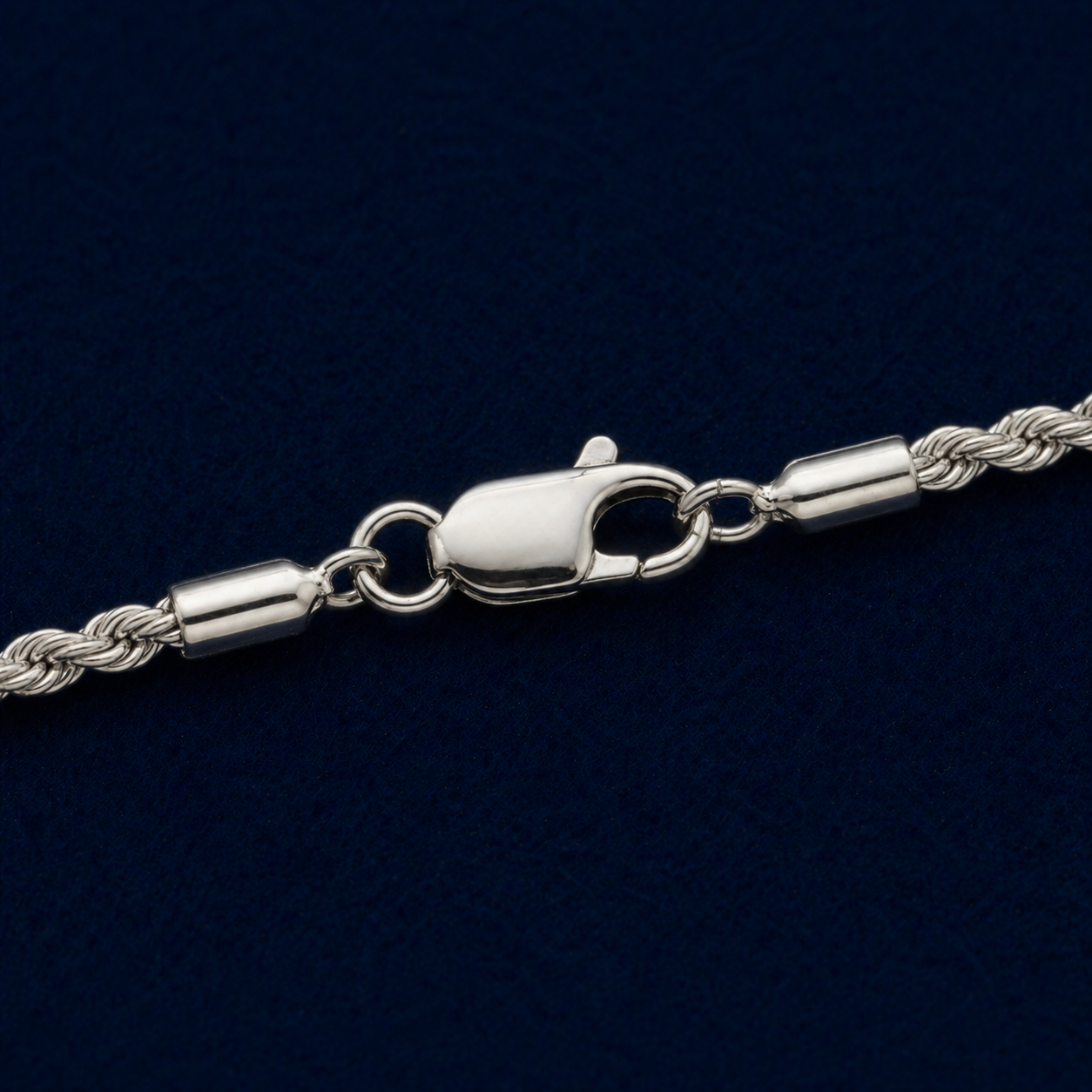 A detailed close-up of the Easy Everyday Elegance necklace highlighting the intricate twisted rope texture of the sterling silver chain and its secure lobster clasp closure.