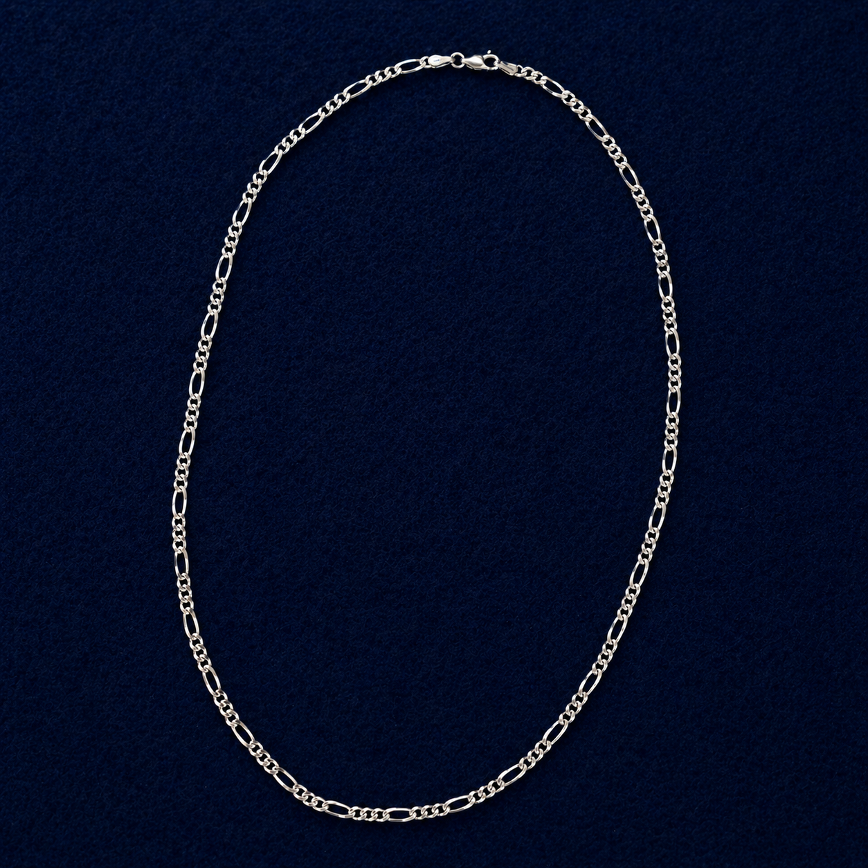 Full view of the Urban Twist necklace featuring bold, twisted paperclip-style links in pure 925 sterling silver, displayed in an elegant oval arrangement.